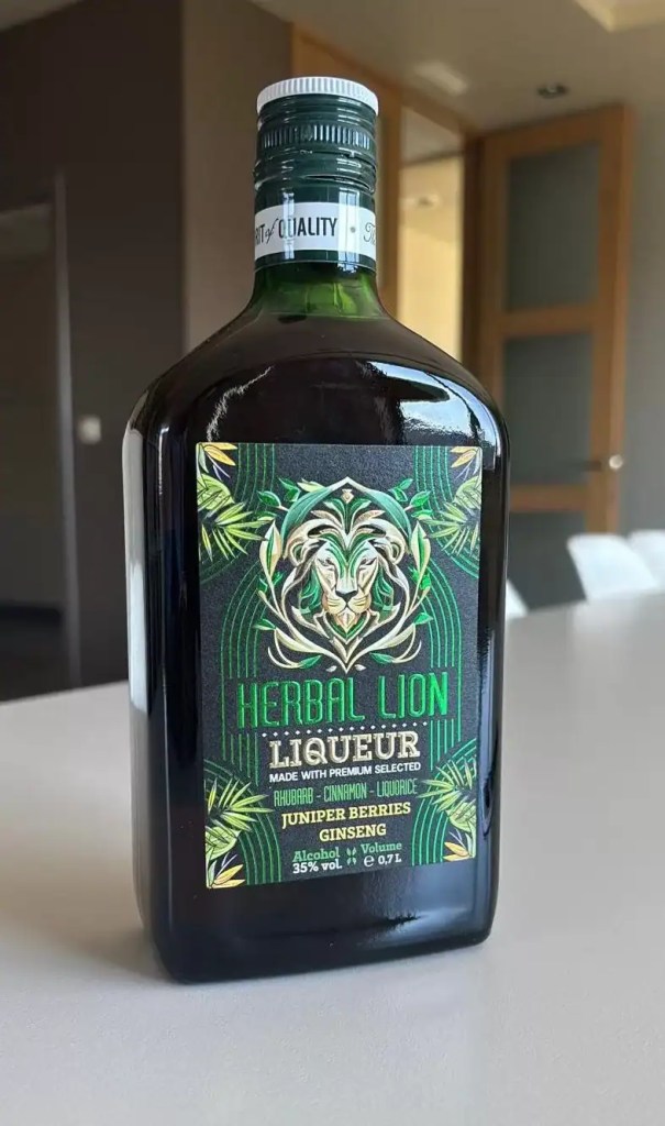 Premium label design for Herbal Lion liqueur — green bottle featuring a stylised lion, golden finish, and botanical motifs.